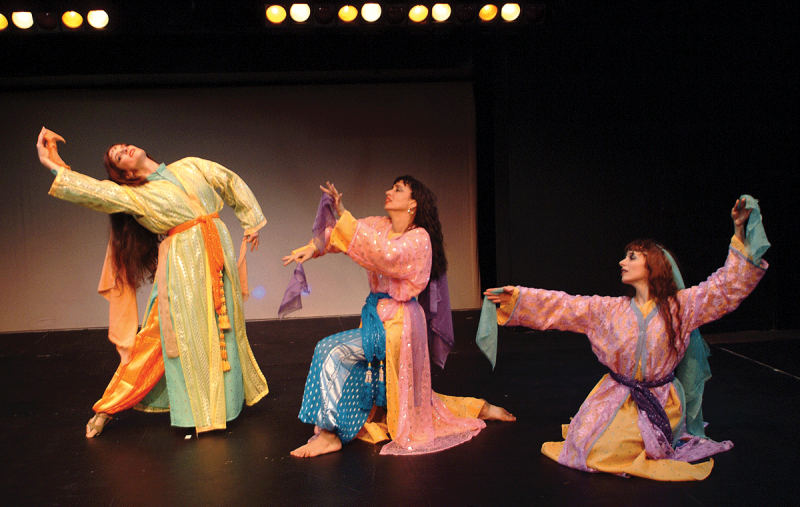 Three dancers dressed as Moorish princesses