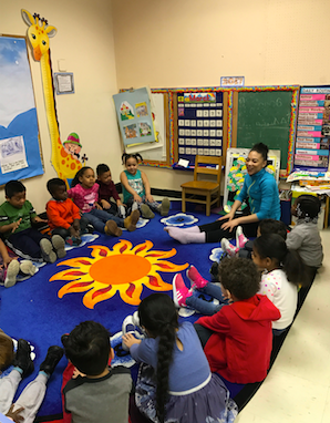 Samantha ( curriculum writer ) working with the children