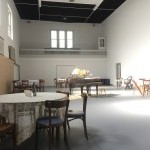 Image is of several tables and chairs placed at Brooklyn Studios for Dance