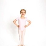 Preschool aged dancer in ballet uniform 