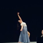 Solo student dancer on large stage