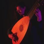 man playing lute