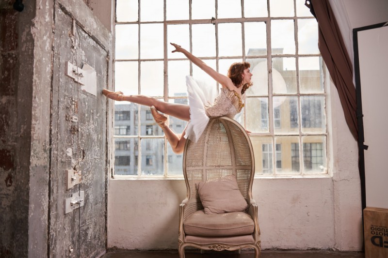 ballerina suspended in the air like an ornament