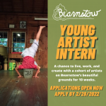 A person inverted inside a bucket that reads "Not a Bucket" alongside the Bearnstow Logo and text reading "Young Artist Intern"