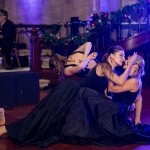 Two female dancers dancing tango in shot