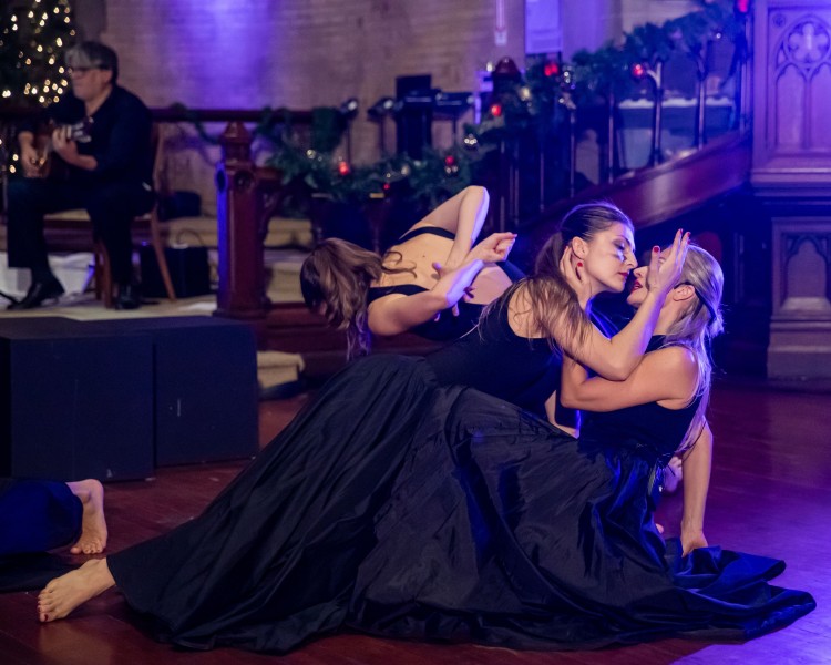 Two female dancers dancing tango in shot