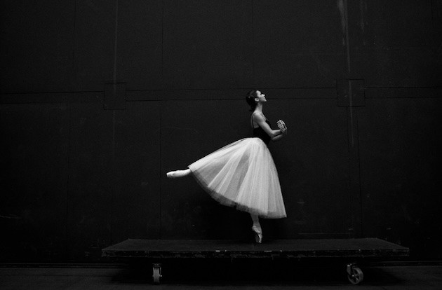 A ballerina en pointe in an arabesque