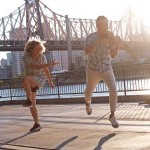 Photo from outdoor Queensboro Dance Festival event at Queensbridge Park, showcasing dance and music 