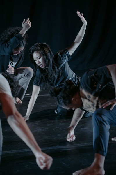 dancers lunging on a dance floor