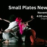 Photo of the work of Shaena Kate and Gabby Meza. Two dancers sit on the floor and embrace with sarms and hands outstretched. 