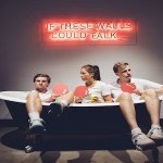 Three people wearing tennis clothing sitting in drained, no functioning bathtub holding ping pong paddles