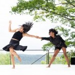 A photo of two dancers in Kyle Marshall's work on the Henry J. Leir Outdoor Stage at Jacob's Pillow Dance Festival.