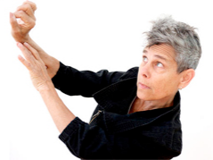 Image of woman with grey hair dancing, JoAnna Mendl Shaw