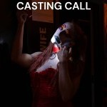 Locke in theatrical zombie drag -esque make up holding a flashlight to their face with the title 'casting call'