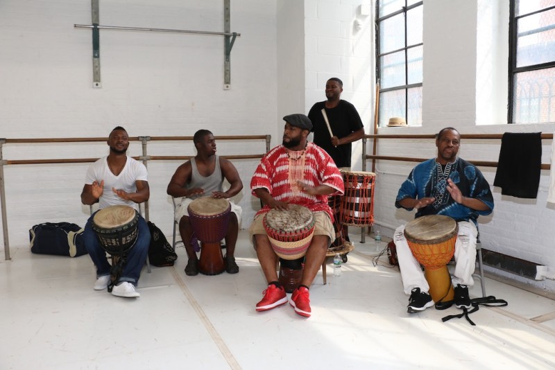 Musicans drumming at the dance class