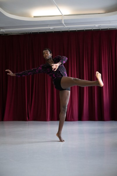 Dancer reaching in a balance