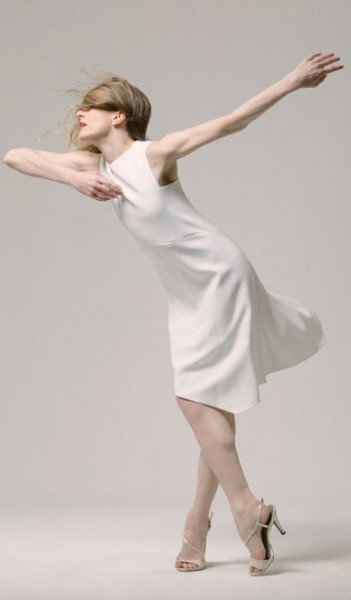 Wendy Whelan strikes a pose in a white dress.