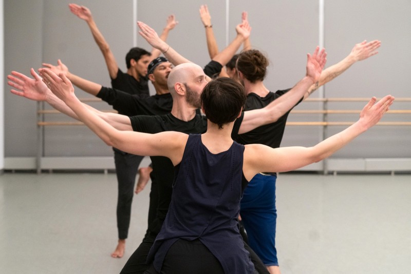 Daniel Gwirtzman Dance Company with Arms Outstretched