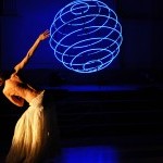 dancer silouhette with blue sphere