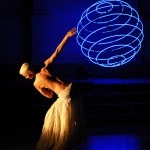 dancer silouhette with blue sphere