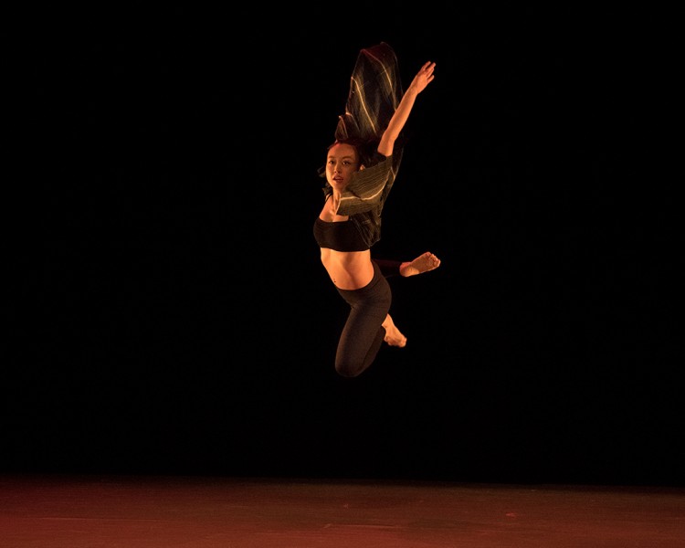 A woman in mid-leap
