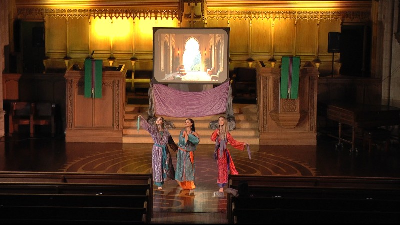 Three dancers dressed as Moorish princesses