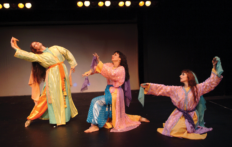 Three dancers in "moorish" costumes