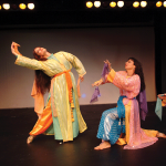 Three dancers dressed as Moorish princesses