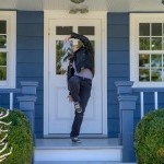 Dancer on blue front porch