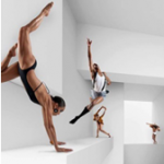 Dancers on white cubes in a white room posing