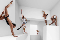 Dancers on white cubes in a white room posing