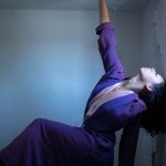 Dancer Shantel Urena explores the architecture of the room