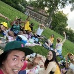selfie of group of new yorkers having a picnic in prospect park